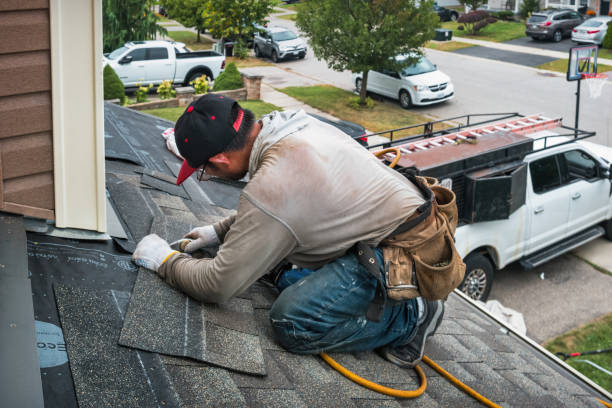Professional Roofing technician working in Scottville, MI